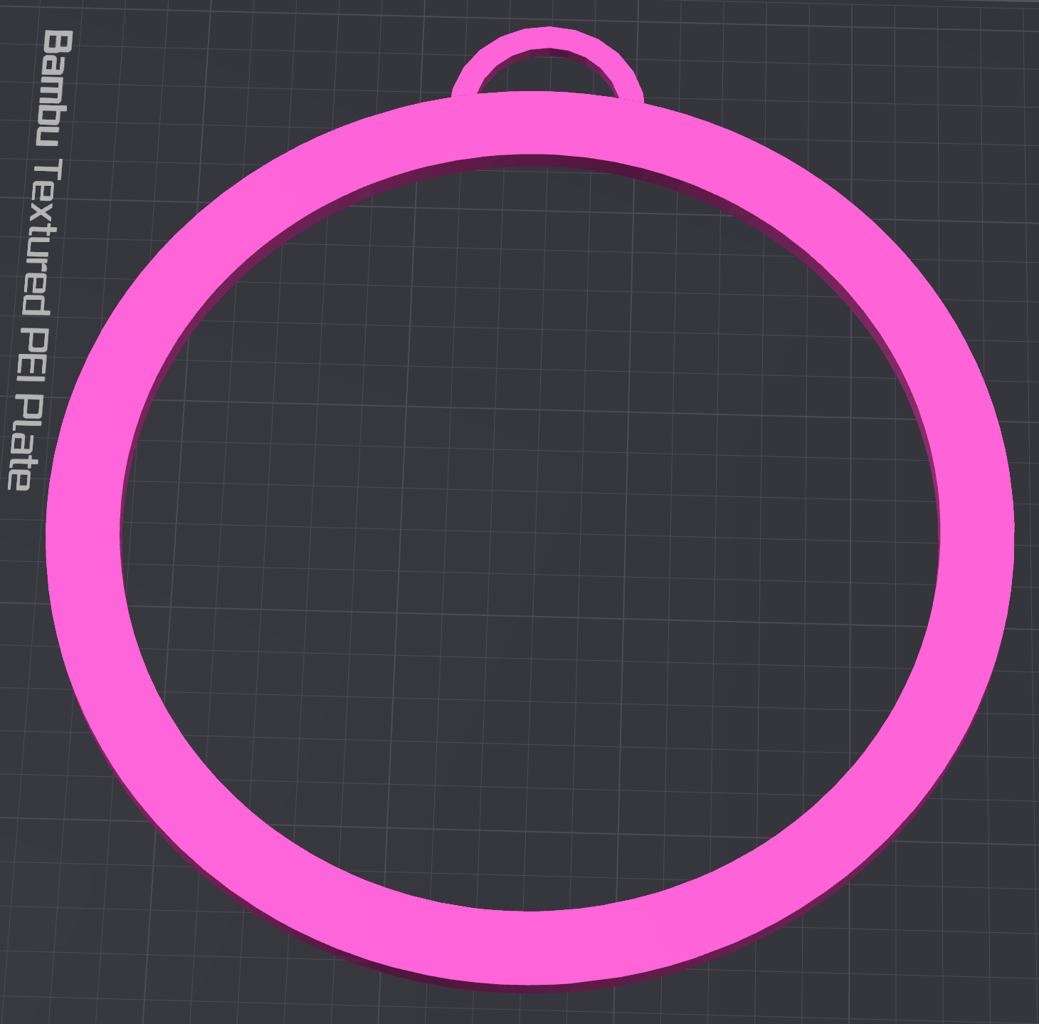 The Circle Boa Bangle STL File (Digital Download) by Viva La Bombshell Burlesque is a flat, pink circular ornament with a top loop, perfect as a 3D printable bangle—shown on a grid labeled "Bambu Textured PEI Plate" on the left.